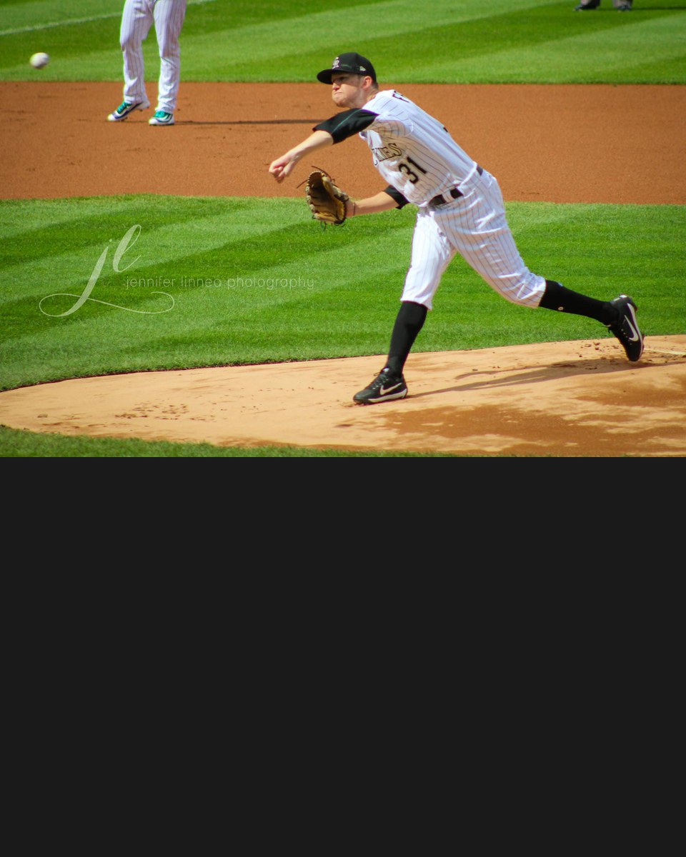 Kyle Freeland pitching for the Colorado Rockies at Coors Field in October 2017.